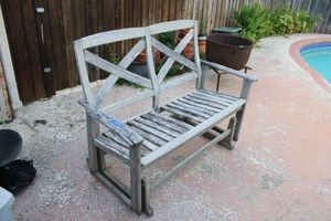 lot 143 image: Wooden glider loveseat (needs a board or two)