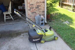 lot 301 image: SunJoe electric lawnmower with charger (see video)