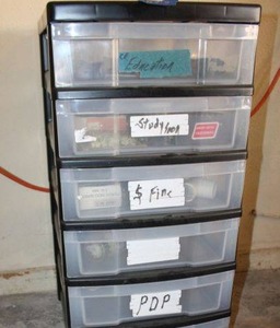 lot 318 image: Plastic storage drawers with tools and hardware