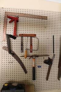 lot 321 image: Misc. tools carpenters square, hammer, hand saw and more