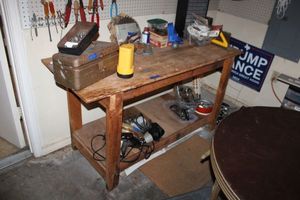 lot 296 image: Solid wood workshop table only (not contents)