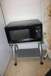 lot 198 image: Microwave with rolling cart