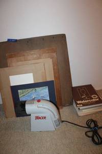 lot 245 image: Painting supplies Tracer projector, boards to tape your canvas to, sketch books, watercolor paints and tray, pencils