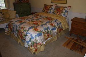 lot 220 image: Full size bed frame (mattress and bedding available)