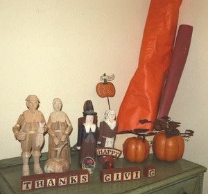 lot 216 image: Thanksgiving decorations as shown, includes Wolf Creek wooden figurines