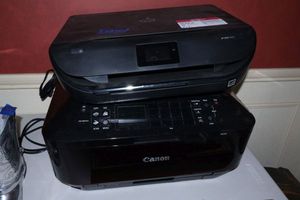 lot 59 image: All-in-one printers and photo paper Canon K10388 and HP Envy 5055 #SNPRC-1702-01