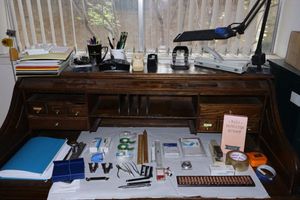 lot 250 image: Office supplies notepads, vintage desk lamp,  copy paper, hole punchers, and more