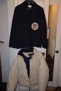 lot 244 image: Mens coat jackets US Coast Guard and Eddie Bauer goose down coat, both size L