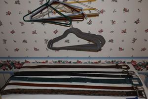 lot 228 image: Leather belts and clothes hangers, see photos