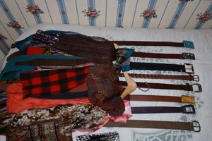 lot 227 image: Womens scarfs and leather belts (some scarfs are silk), see photos
