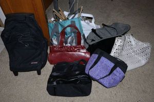 lot 126 image: Leather bags and purses, Baby Roller backpack and extra clothes hangers