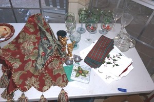 lot 252 image: Christmas glassware, votive candle holders, hand towels and napkins, and tree skirt