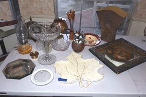lot 133 image: Home dcor Norman Rockwell plate, wall mirror, enameled leaf plate, crystal glass compote, hurricane lamp, fondue set, and cast iron pot
