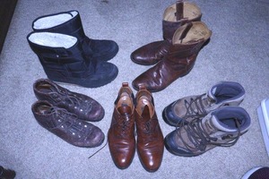 lot 96 image: Shoe lot leather shoes size 9, Merrell work boots, Justin leather boots size 9D, snow boots size 11, Vibram boots