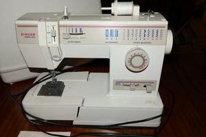 lot 95 image: Singer sewing machine with case, model 9410
