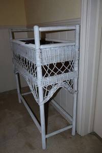 lot 201 image: White wicker plant stand 28W x 11D x 31H
