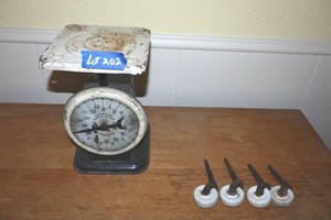 lot 202 image: Vintage scale American Family Scale and ceramic furniture wheels