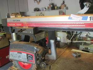lot 7 image: Craftsman radial saw, like new condition works great,