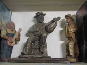 lot 90 image: male statues playing music