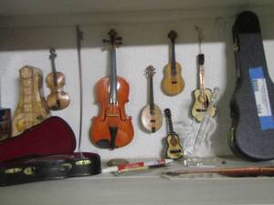 lot 104 image: mini violin and guitar pieces