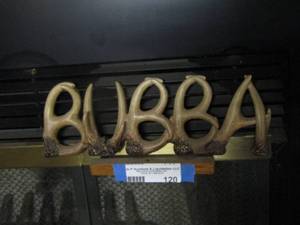 lot 120 image: Bubba wall dcor made out of deer antlers
