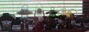 lot 176 image: mini lanterns and mini oil lamps
