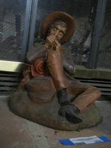 lot 208 image: Man  sitting & eating   Statue no name