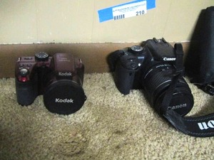 lot 210 image: Kodak camera, canon camera