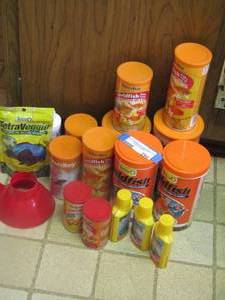 lot 290 image: new and used lot of fish food and tank chemicals