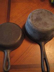 lot 299 image: cast iron skillet and sauce pan with lid