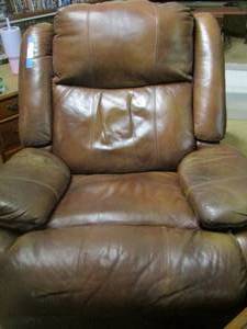 lot 194 image: brown leather rocking recliner in good condition very comfy