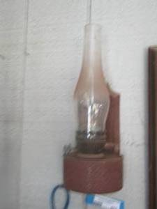 lot 405 image: oil lantern - hummingbird wind chime