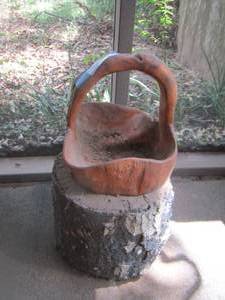 lot 416 image: handled planter sitting log