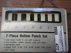 lot 477 image: 7 piece hollow punch set in case-
