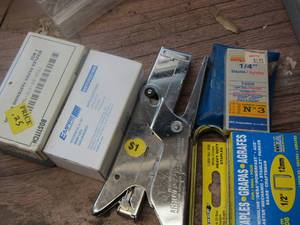 lot 494 image: hand stapler and many boxes of staples new and used