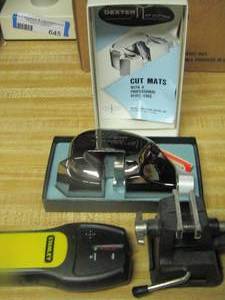 lot 648 image: stanley stud finder, clamp, dexter at cutter cut mats