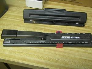 lot 650 image: paper hole punch and rulerstapler