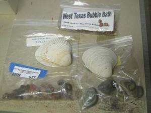 lot 657 image: West Texas bubble bath, seashells, small rocks