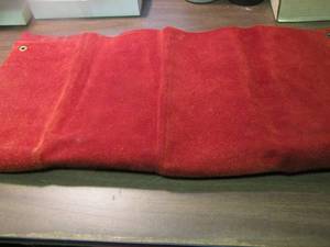 lot 713 image: piece of leather to wear around your waist  24 X 23