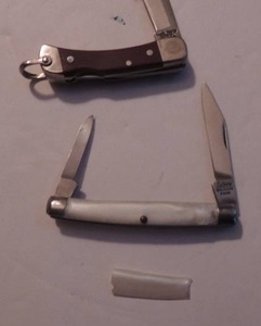 lot 513 image: Schrade lock back knife Uncle Henry 1 34 blade sabre - 2 blade - 2  1 12 blade (one side is broken, piece included)