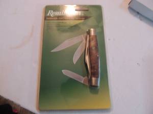 lot 632 image: Remington - insigna edition large stockman - burl wood handle 4 closed length - 3 blades in package