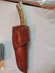 lot 819 image: j.L. barbie hunting knife stag handle , brass tang #1399 3 34 blade , 8 long leather sheath