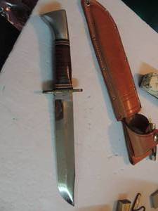 lot 99 image: vintage western hunting knife - l46-6 stacked handle , brass tang in a leather sheath boulder Colorado