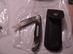 lot 219 image: schrade old timer mustang 1250t - 9 14 length blade 4, vintage in leather holder