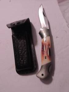 lot 279 image: old smokey lock back knife 3 blade , 4 closed leather holder
