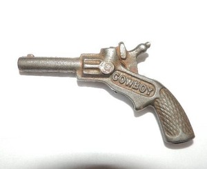 lot 461 image: Antique cast iron single shot cowboy cap gun w leather holster 3 12 length