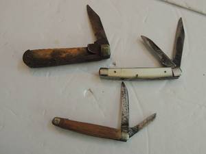 lot 972 image: coast lockback knive on chain 2 blade , 3 closed