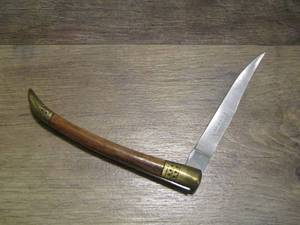 lot 598 image: tomhawk brand pocket knife 3 12 blade, 7 12 long