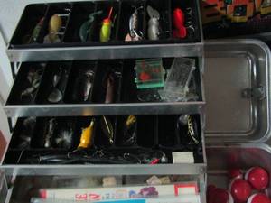 lot 870 image: silver tackle box with multiple lures and bobbers