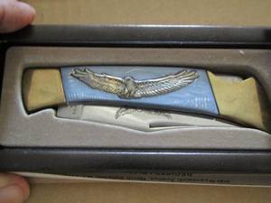 lot 588 image: blue and gold handled knife 3 38 blade - 7 12 long